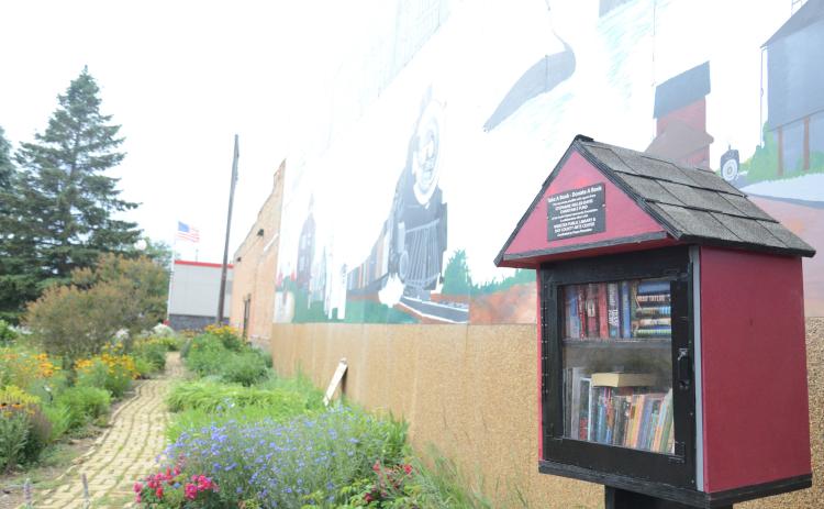 Little Free Library structures are around Webster and the surrounding area. Pictured is one in the Day County arts Center Mural Garden constructed by Chase Shoemaker for the Webster City Library. Reporter &amp; Farmer | Annie Witt