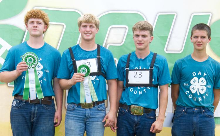 Senior goat showmanship placers at the Day County Fair Aug, 8 are, from left, grand champion Delaney Atherton, reserve champion Michael Dorsett, third place Martin Dorsett and fourth place Knute Hemmingson. Reporter &amp; Farmer | Leyton Beardslee