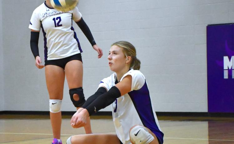 Liza Purdy (7) of Waubay/Summit receives a serve during the Mustang’s 0-3 match loss to Northwestern Area in Waubay Sept. 25. Set scores for the match were 13-25, 8-25 and 15-25. Reporter &amp; Farmer | Leyton Beardslee