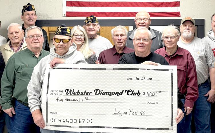 Webster American Legion donated funds to Webster Diamond Club. Pictured from left, holding the check are Randy Gaikowski and Mike Wiley; second row, Jeff Nelson, Paul Peterson, Paul Tvinnereim, Kris Tvinnereim, Dennis Kurkowski, Wayne Klungseth, Chuck Johnson, Zach Witte; back, Dennis DeWitte, Allan Weismantel, Tom Sannes, Tom Lewno, Rich Lesnar, Bob Page and Chad Hesla. Reporter &amp; Farmer | Subscriber snapshot