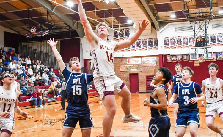 Matthew Mount (14) of Webster Area drives to the basket during the Bearcats 57-38 victory over Great Plains Lutheran Panthers Feb. 3 in Webster. The win brought Webster to a 6-6 record on the season. Reporter &amp; Farmer | Connor Handrahan