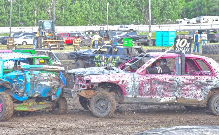 The demolition derby was a litteral hit during the Day County Fair Aug. 8. Attending participants got to see three events full of action. Here, in car 10X Stuart Orth has just pushed the black car, Hayden McCarlson and starts to hunt for his next target. Reporter &amp; Farmer | Connor Handrahan