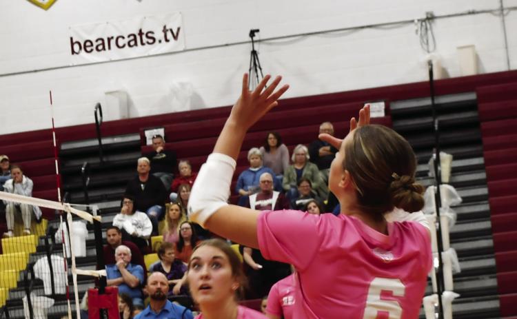 Allison Case (6) attempts to set up her teammates as the Webster Area Bearcats faced off against the Milbank Bulldogs Oct. 1. at the armory. The Bearcats won the match in four sets. Also pictured is Mallory Steiner (10). Reporter &amp; Farmer | Brenner Cariveau