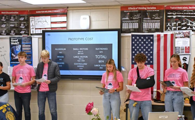 Webster Area Robocats team gives a presentation Nov. 16 to community members giving a breakdown of the time and fundraising invested into their club. Robocats members are, from left, Jocelyn Rumpca, Jackson Baumgarn, Grady Wagner, Kenley Grewe, Gavon Larson, Marlee Dornbusch and Kala Kwasniewski. Reporter & Farmer | Connor Handrahan