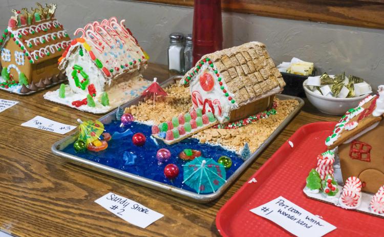 Gingerbread houses built by employees of Pereboom’s Cafe in Webster were created Dec. 14 at their employee holiday party. Community members can vote on their favorite design to determine a winner. Reporter &amp; Farmer | Leyton Beardslee