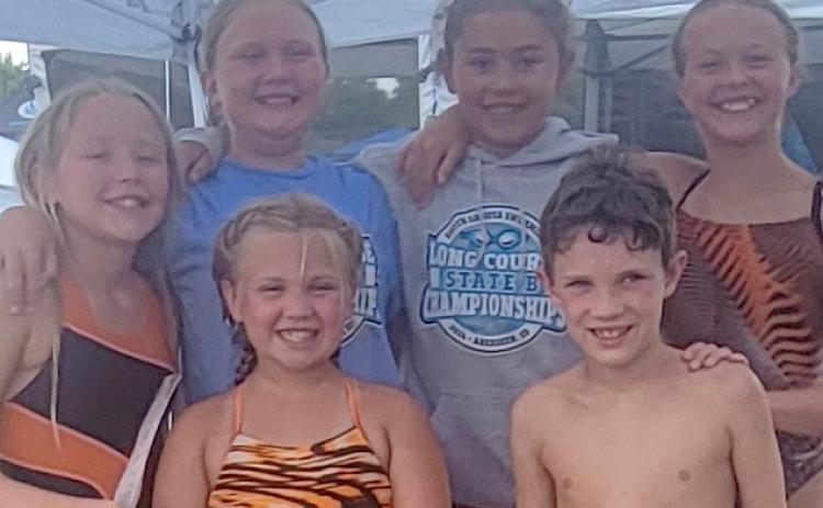 Area swimmers competing in the state B swimming championships, their place and respective category are from left, front, Aaliyah Lone 13th girls 9-10, Jonathan Fosheim first boys eight and under; back, Hadley Rithmiller 17th girls 11-12, Karley Lone 24th girls 11-12, Keisha Rencountre fifth girls 9-10 and Portlyn Johnson 29th girls 11-12. Reporter &amp; Farmer | Subscriber snapshot